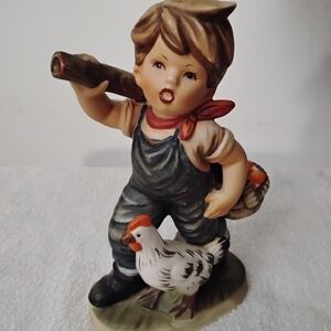 Vtg. Porcelain Charming Boy with Chicken Figurine